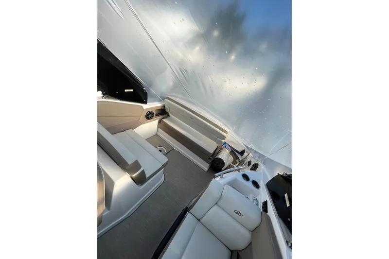 Slide: The Image of 2017 Regal 28 Express boat dashboard with Garmin navigation system and controls. - 6