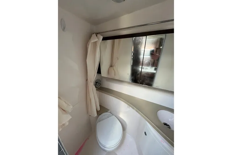 Slide: The Image of 2017 Regal 28 Express dashboard with gauges and control switches. - 9