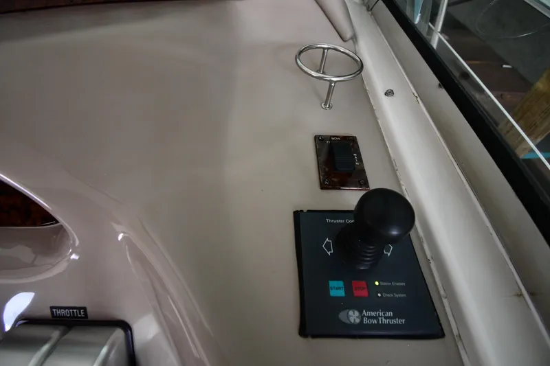 Slide: The Image of Control panel of a 2001 Sea Ray 540 Sundancer with American Bow Thruster joystick. - 14