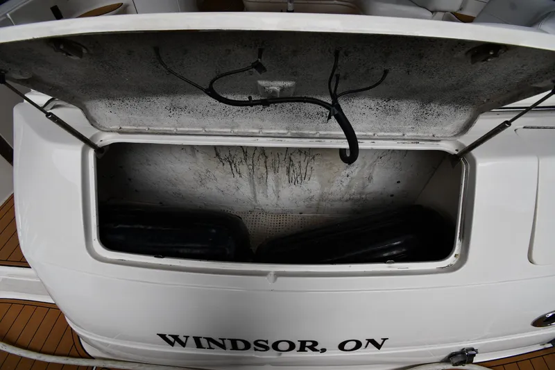 Slide: The Image of Open storage compartment on a 2001 Sea Ray 540 Sundancer boat, Windsor, ON. - 27
