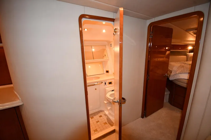 Slide: The Image of Interior of 2001 Sea Ray 540 Sundancer yacht showing bathroom and bedroom. - 35