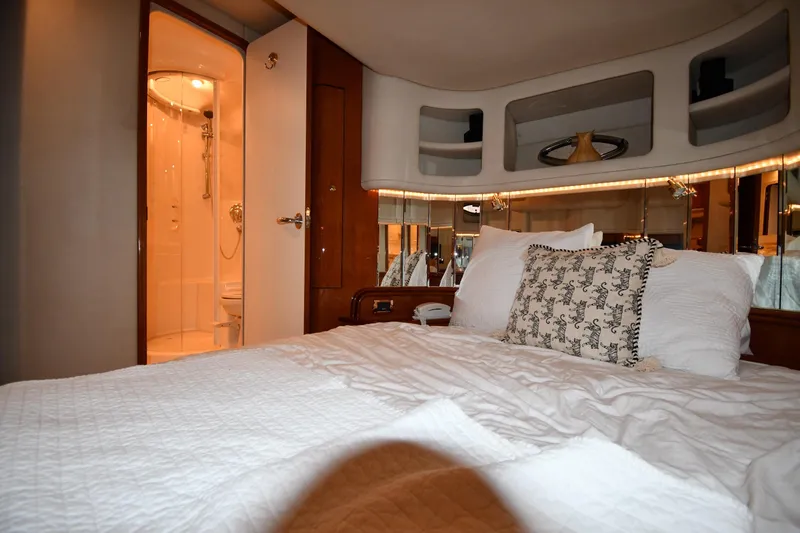 Slide: The Image of Luxurious bedroom interior of 2001 Sea Ray 540 Sundancer yacht with ensuite bathroom. - 49