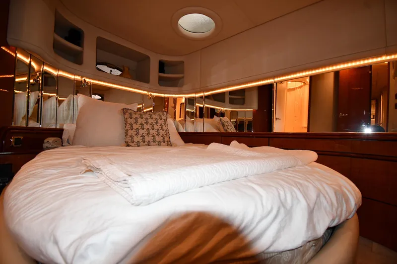 Slide: The Image of Luxurious bedroom interior of 2001 Sea Ray 540 Sundancer yacht with elegant bedding. - 51