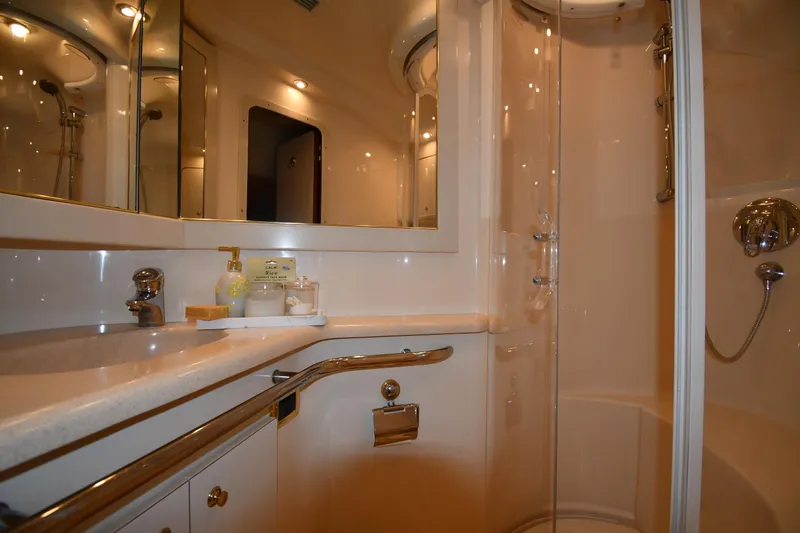 Slide: The Image of Luxurious bathroom in 2001 Sea Ray 540 Sundancer yacht with modern fixtures and shower. - 53