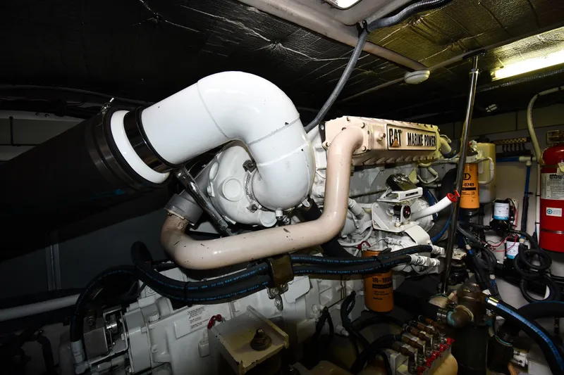 Slide: The Image of Engine room of 2001 Sea Ray 540 Sundancer with CAT Marine Power engine. - 64
