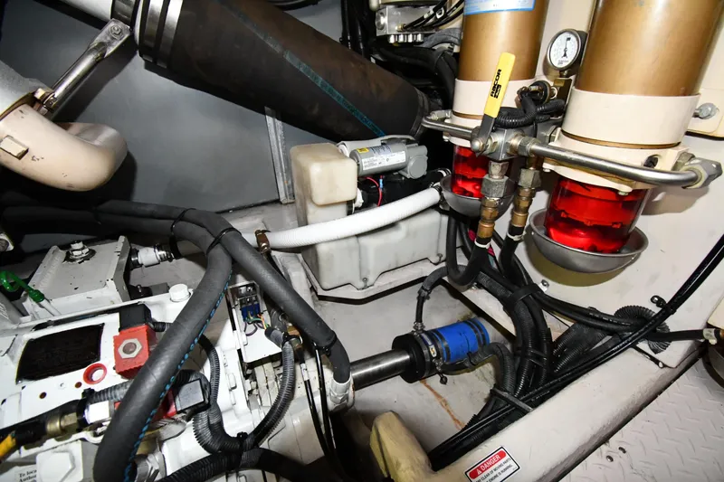 Slide: The Image of Engine room of 2001 Sea Ray 540 Sundancer with visible components and wiring. - 66