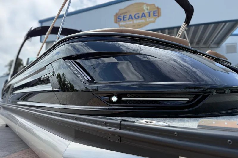 Slide: The Image of 2026 Bennington 30 QXSBAX2 boat with sleek black design at Seagate Marine Sales. - 1