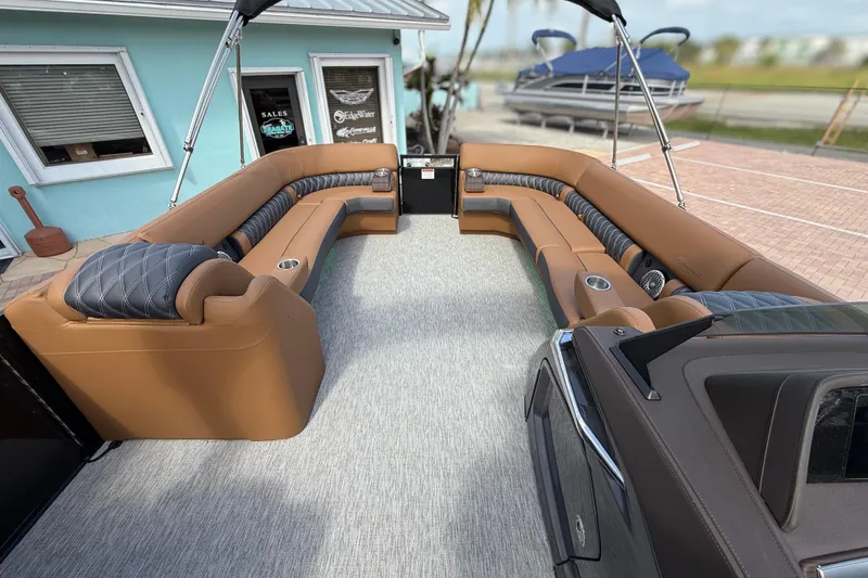 Slide: The Image of Luxurious interior of 2026 Bennington 30 QXSBAX2 pontoon boat with plush seating. - 12