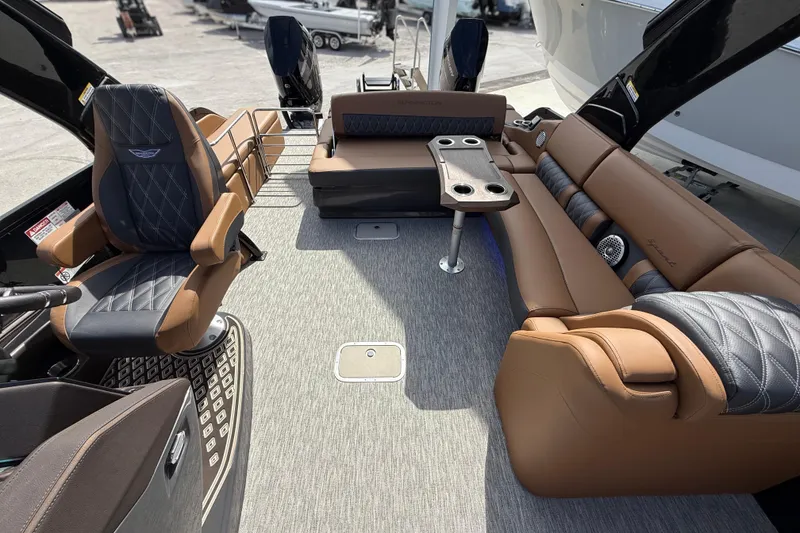 Slide: The Image of Luxurious interior of 2026 Bennington 30 QXSBAX2 boat with plush seating and modern design. - 15
