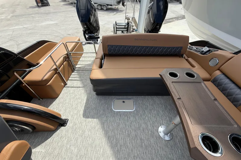 Slide: The Image of Luxurious interior of 2026 Bennington 30 QXSBAX2 pontoon boat with plush seating and table. - 20