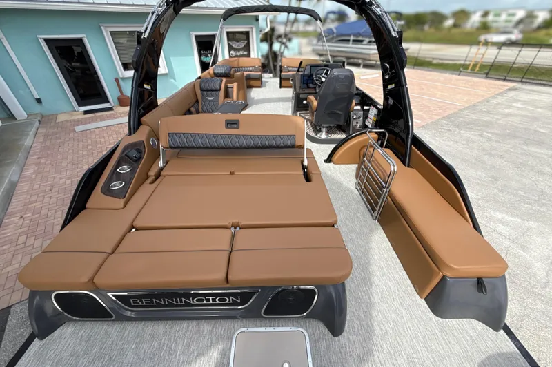 Slide: The Image of 2026 Bennington 30 QXSBAX2 luxury pontoon boat with spacious seating and modern design. - 28