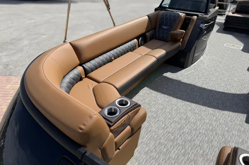 Slide: The Image of Luxurious seating on 2026 Bennington 30 QXSBAX2 pontoon boat with cup holders and premium upholstery. - 7