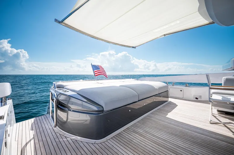 Slide: The Image of Luxurious 2024 Azimut S7 yacht deck with sunbed and ocean view. - 15