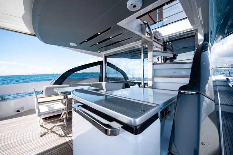 Slide: The Image of Luxurious 2024 Azimut S7 yacht deck with modern seating and ocean view. - 18
