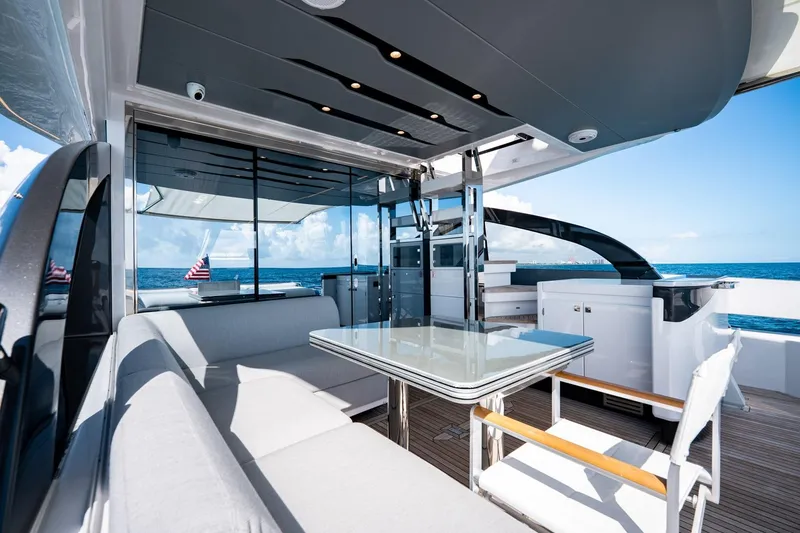 Slide: The Image of Luxurious 2024 Azimut S7 yacht interior with modern seating and ocean view. - 20