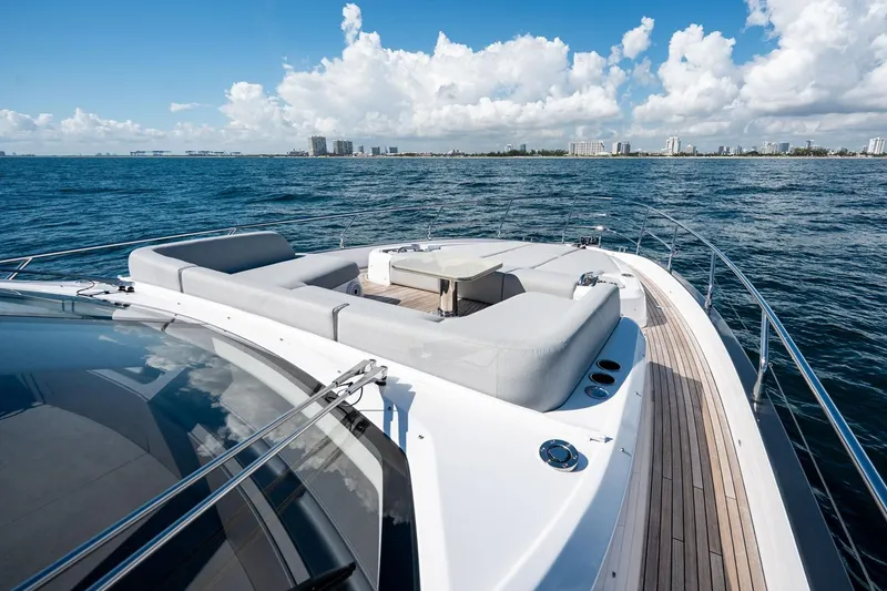 Slide: The Image of Luxurious 2024 Azimut S7 yacht with spacious deck, cruising on open water under a clear sky. - 30