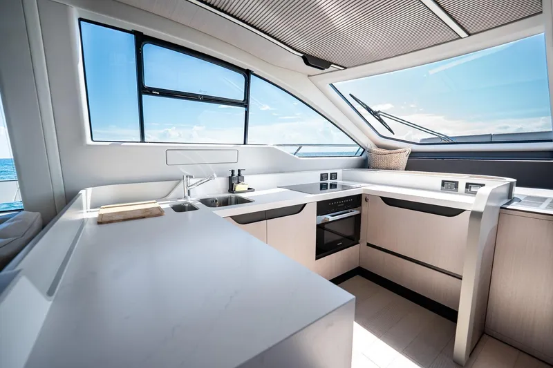 Slide: The Image of Modern kitchen interior of 2024 Azimut S7 yacht with ocean view. - 37