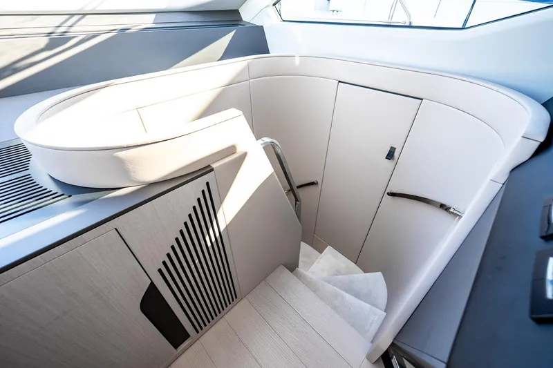 Slide: The Image of Interior staircase of 2024 Azimut S7 yacht, featuring sleek modern design and elegant finishes. - 40