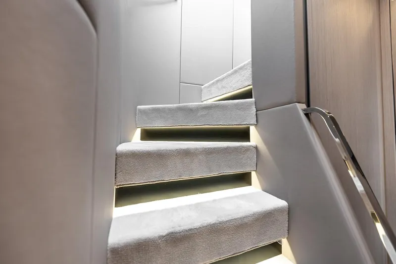 Slide: The Image of Luxurious interior staircase of 2024 Azimut S7 yacht with modern lighting. - 42