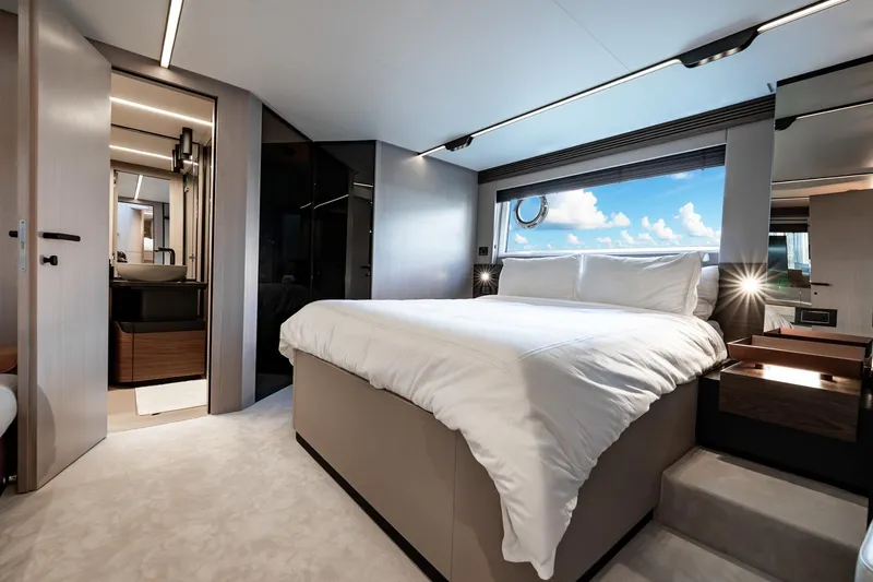 Slide: The Image of Luxurious bedroom interior of 2024 Azimut S7 yacht with ocean view window. - 43