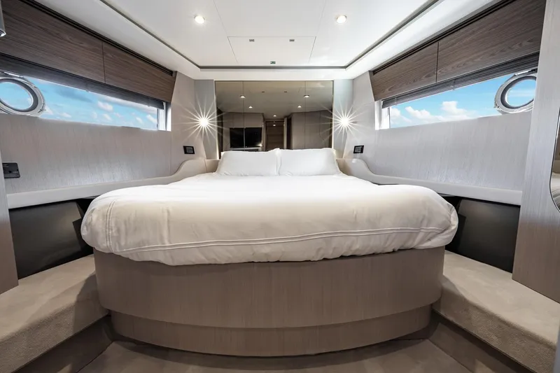 Slide: The Image of Luxurious bedroom interior of 2024 Azimut S7 yacht with modern design and elegant furnishings. - 49
