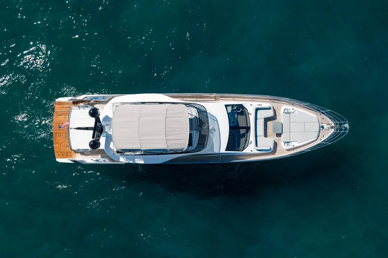 Slide: The Image of Aerial view of 2024 Azimut S7 luxury yacht on clear blue water. - 5
