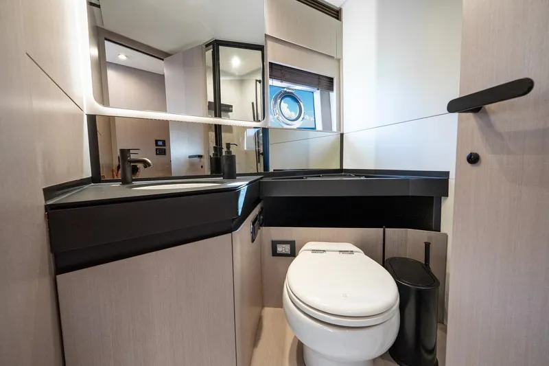 Slide: The Image of Luxurious bathroom in 2024 Azimut S7 yacht with modern fixtures and sleek design. - 50
