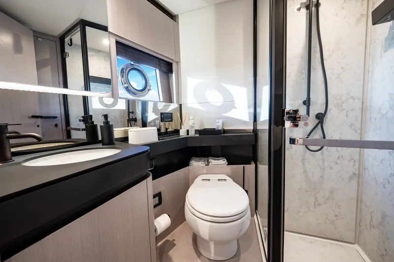 Slide: The Image of Luxurious bathroom in 2024 Azimut S7 yacht with modern fixtures and elegant design. - 53