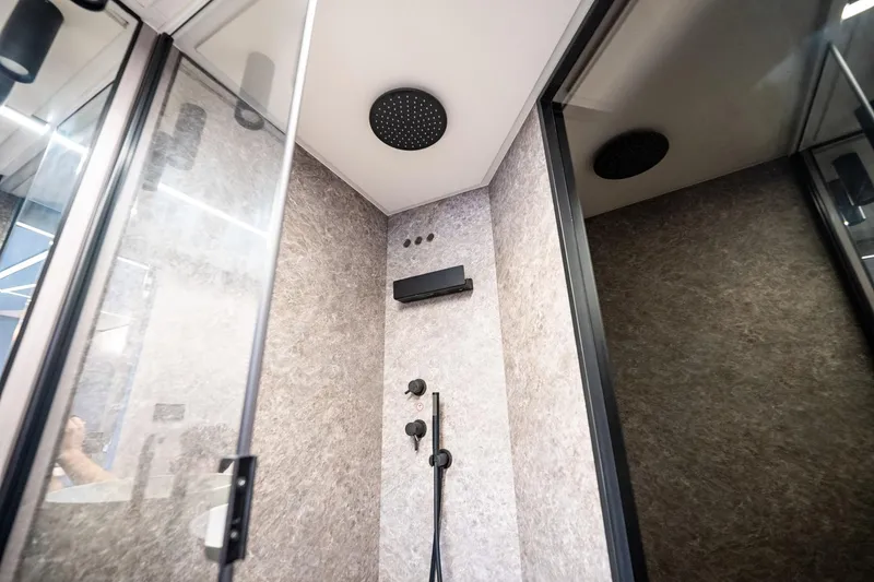 Slide: The Image of Luxurious shower interior in 2024 Azimut S7 yacht, featuring modern fixtures and elegant design. - 56