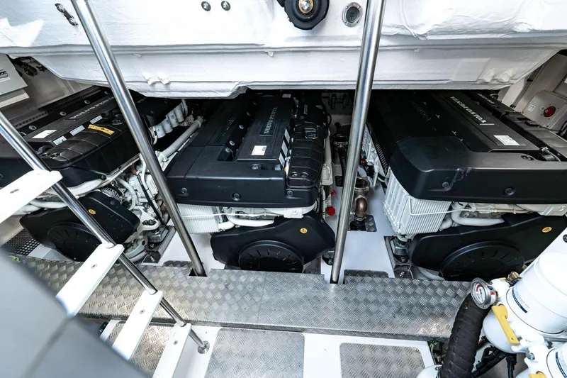 Slide: The Image of Engine room of 2024 Azimut S7 yacht with twin engines and metallic flooring. - 63