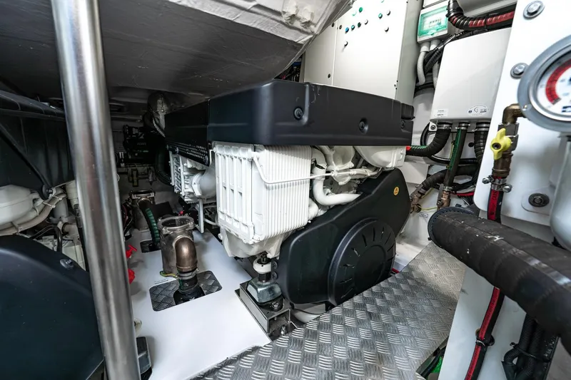 Slide: The Image of Engine room of 2024 Azimut S7 yacht, showcasing advanced mechanical components and systems. - 64