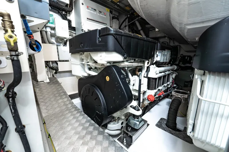 Slide: The Image of Engine room of 2024 Azimut S7 yacht, showcasing advanced mechanical components and systems. - 65