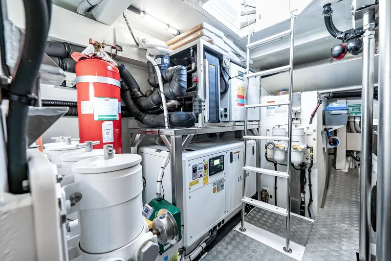 Slide: The Image of Engine room of 2024 Azimut S7 yacht with equipment and safety features. - 67