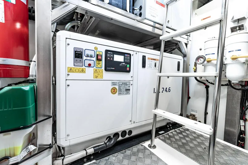 Slide: The Image of Engine room of 2024 Azimut S7 yacht with control panel and ladder. - 68