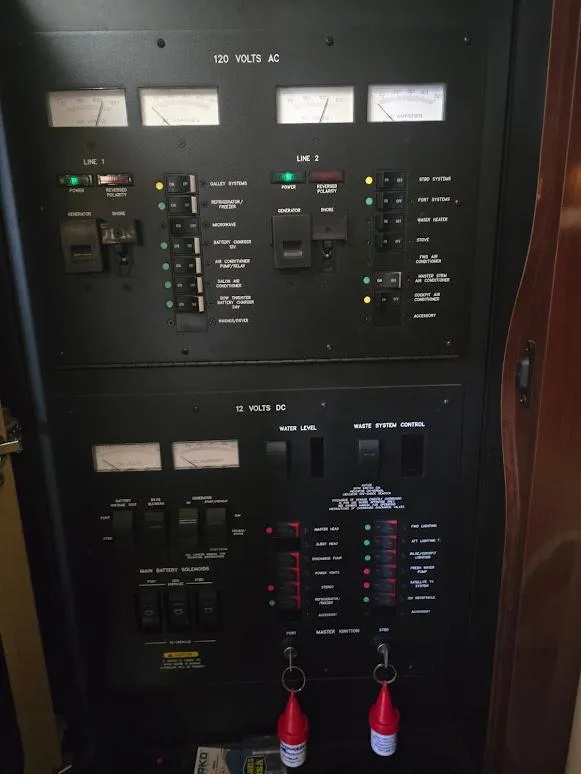 Slide: The Image of Electrical control panel on a 2008 Sea Ray 40 Sundancer boat. - 22