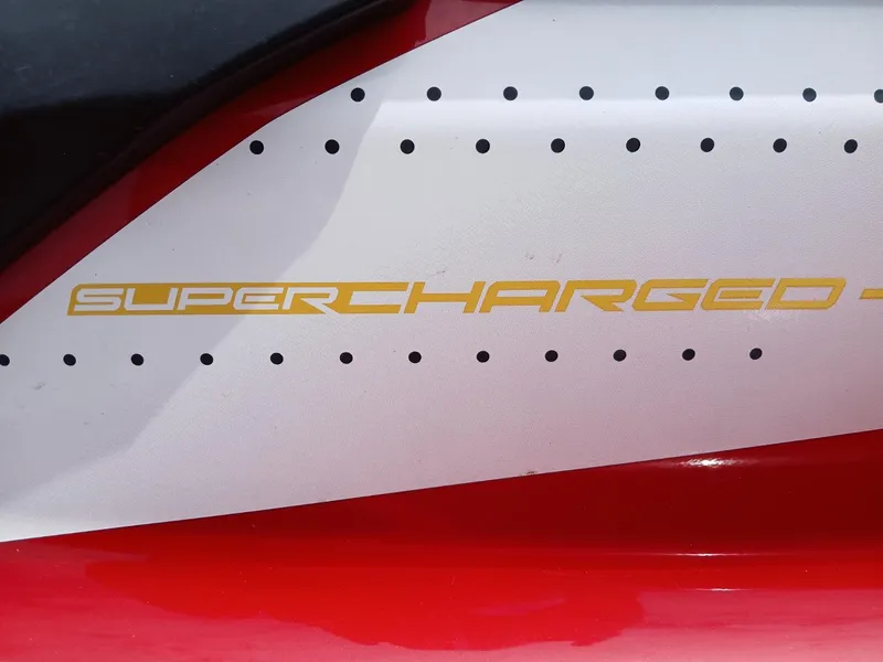Slide: The Image of 2021 Yamaha WaveRunner FX SVHO with "Supercharged" decal on red and white body. - 5
