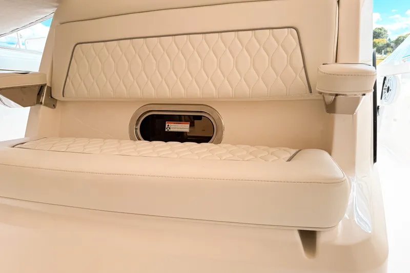 Slide: The Image of Luxurious seating on 2026 Pursuit S 328 Sport boat with quilted upholstery. - 28