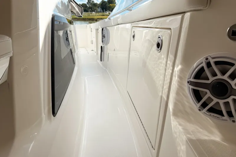 Slide: The Image of 2026 Pursuit S 328 Sport boat interior with sleek design and audio system. - 29