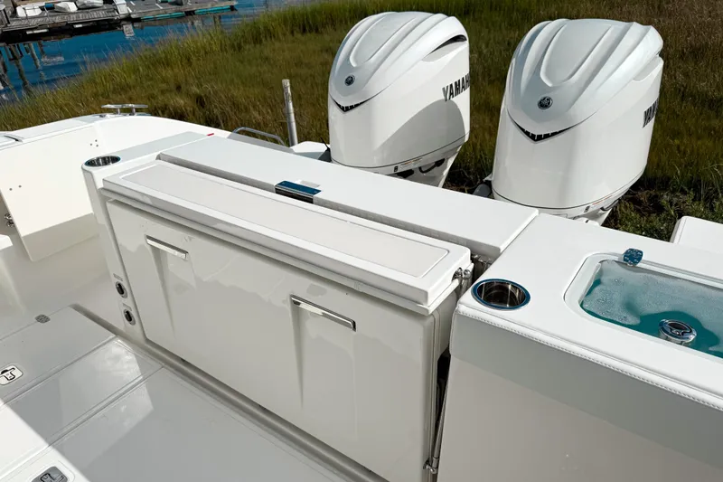 Slide: The Image of 2026 Pursuit S 328 Sport boat with Yamaha engines and fishing amenities. - 7