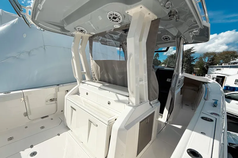 Slide: The Image of 2026 Pursuit S 328 Sport boat interior with sleek design and modern features. - 9