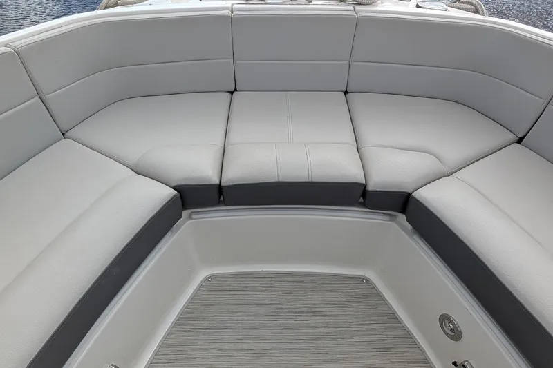 Slide: The Image of Luxurious seating on 2023 Sea Ray 310 SLX boat with elegant upholstery design. - 21