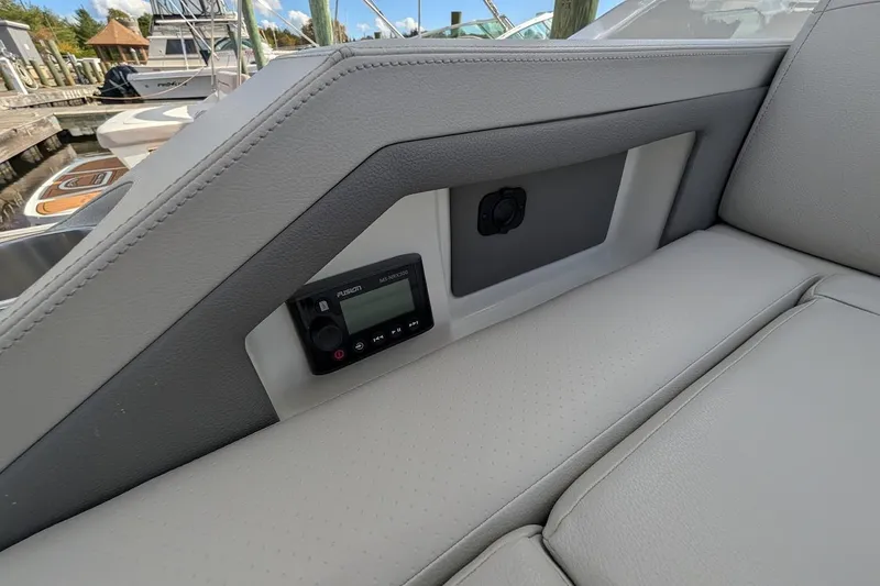 Slide: The Image of 2023 Sea Ray 310 SLX boat interior with luxurious seating and modern design. - 5