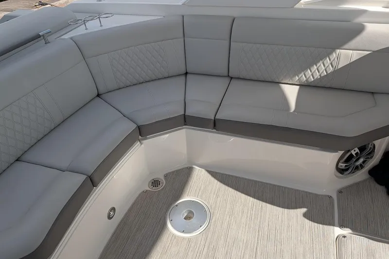 Slide: The Image of Luxurious interior of 2023 Sea Ray 310 SLX boat with plush seating and modern design. - 8
