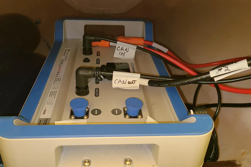 Slide: The Image of Electrical system with labeled cables in a 2007 Scarab 22 boat. - 15