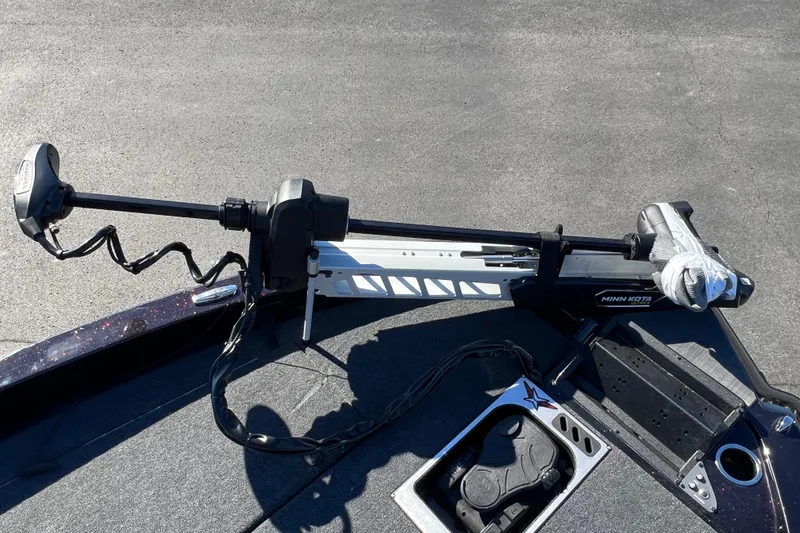 Slide: The Image of 2026 Vexus DVX20S boat with Minn Kota trolling motor on deck. - 11