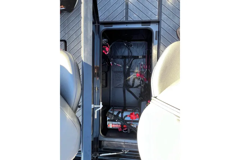 Slide: The Image of Interior view of 2026 Vexus DVX20S boat showing battery compartment and wiring. - 34