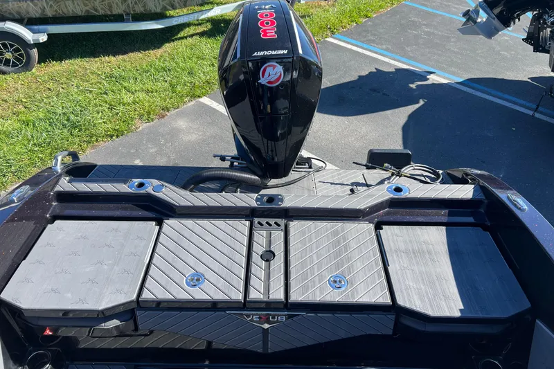 Slide: The Image of 2026 Vexus DVX20S boat with Mercury engine, featuring sleek deck design. - 35