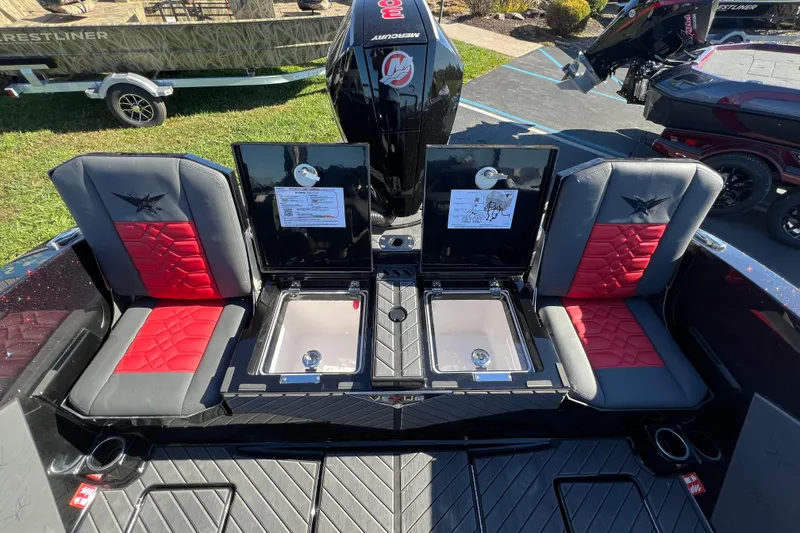 Slide: The Image of 2026 Vexus DVX20S boat interior with red and gray seating, open storage compartments. - 37