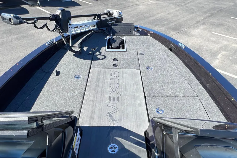 Slide: The Image of 2026 Vexus DVX20S boat deck with trolling motor and storage compartments. - 5