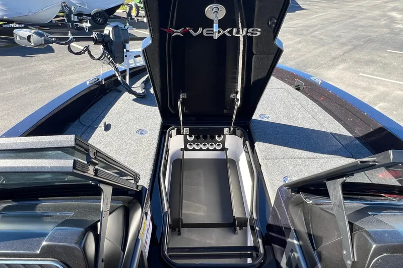 Slide: The Image of 2026 Vexus DVX20S boat interior with open storage compartment and sleek design. - 6